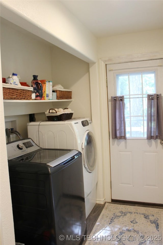 423118 E 1944th Ln, Antlers, OK 74523 - laundry room with washing machine and dryer and wood finished floors