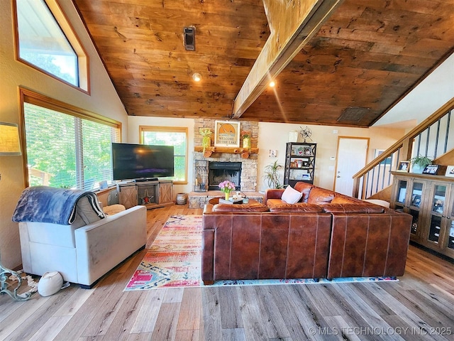 35824 S Talon Dr, Cookson, OK 74427 - living room featuring wood ceiling, light wood-style flooring, vaulted ceiling, a stone fireplace, and stairway
