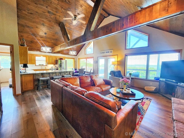 35824 S Talon Dr, Cookson, OK 74427 - living area with wooden ceiling, light wood-type flooring, high vaulted ceiling, beam ceiling, and ceiling fan