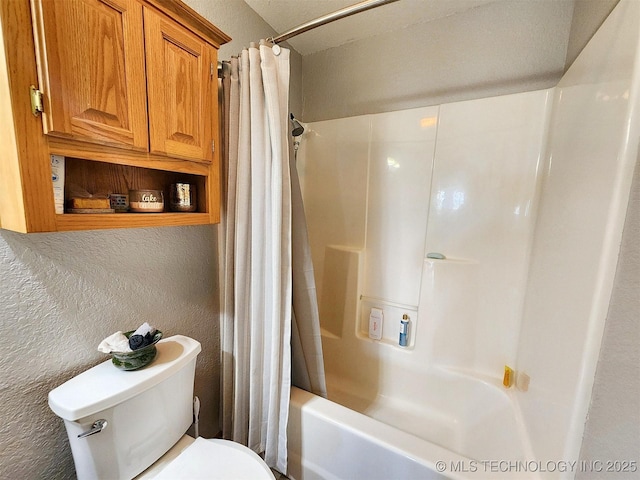 35824 S Talon Dr, Cookson, OK 74427 - bathroom with toilet, a textured wall, and shower / bath combo with shower curtain