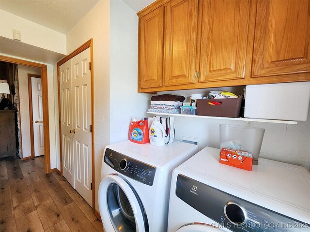35824 S Talon Dr, Cookson, OK 74427 - laundry area with separate washer and dryer, cabinet space, and wood finished floors