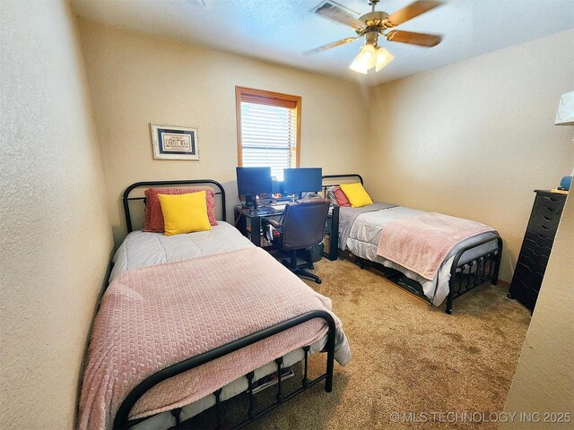 35824 S Talon Dr, Cookson, OK 74427 - carpeted bedroom with a textured wall and ceiling fan