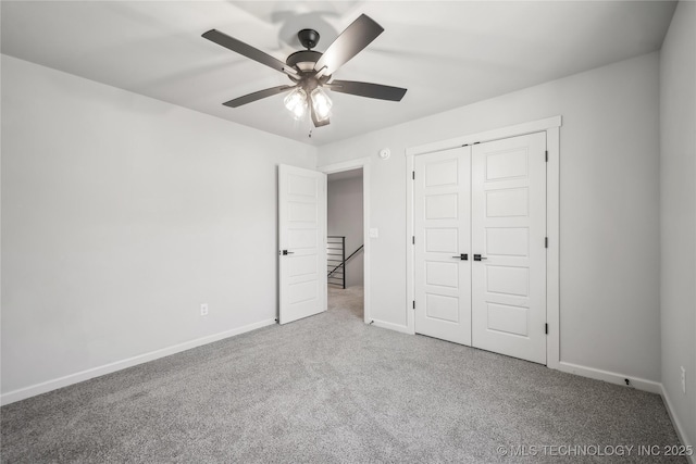 2044 E 138th Pl S, Bixby, OK 74008 - unfurnished bedroom with carpet, baseboards, a closet, and ceiling fan