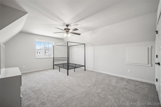 2044 E 138th Pl S, Bixby, OK 74008 - unfurnished bedroom featuring vaulted ceiling, carpet, baseboards, and a ceiling fan