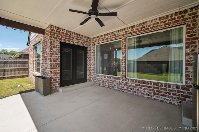 2044 E 138th Pl S, Bixby, OK 74008 - view of patio featuring a ceiling fan, fence, and french doors