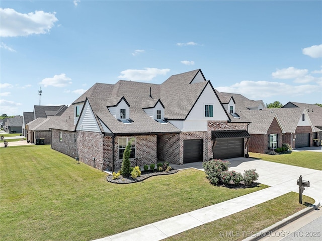 2044 E 138th Pl S, Bixby, OK 74008 - view of front of property with brick siding, a front yard, concrete driveway, and a garage