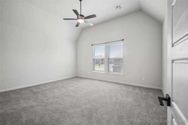 2044 E 138th Pl S, Bixby, OK 74008 - spare room with vaulted ceiling, carpet floors, ceiling fan, and baseboards