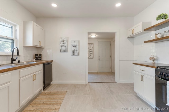 kitchen with a sink, black appliances, open shelves, wood counters, and backsplash