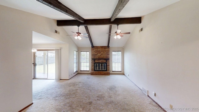 1703 Vaden Ln, Ardmore, OK 73401 - unfurnished living room with carpet, beamed ceiling, a fireplace, high vaulted ceiling, and baseboards