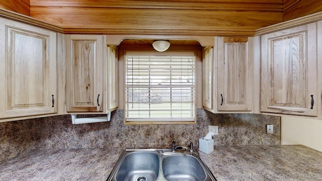 1703 Vaden Ln, Ardmore, OK 73401 - kitchen featuring backsplash, a sink, light brown cabinets, and light countertops