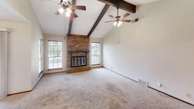 1703 Vaden Ln, Ardmore, OK 73401 - unfurnished living room featuring ceiling fan, carpet, a brick fireplace, and baseboards