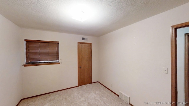 1703 Vaden Ln, Ardmore, OK 73401 - unfurnished room featuring carpet and baseboards