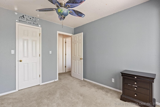 619 S Magnolia Pl, Broken Arrow, OK 74012 - unfurnished bedroom with carpet flooring, baseboards, and ceiling fan