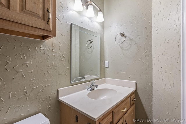 619 S Magnolia Pl, Broken Arrow, OK 74012 - half bathroom featuring vanity and toilet