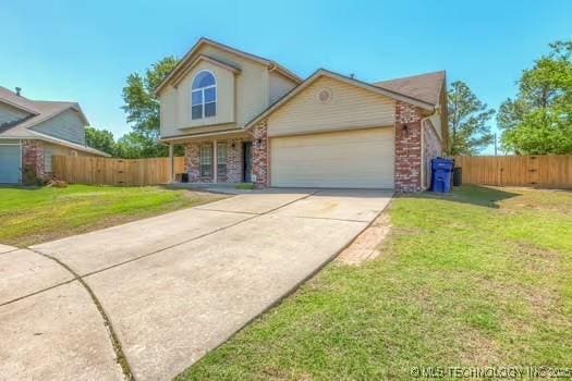 619 S Magnolia Pl, Broken Arrow, OK 74012 - traditional-style home featuring an attached garage, driveway, and brick siding