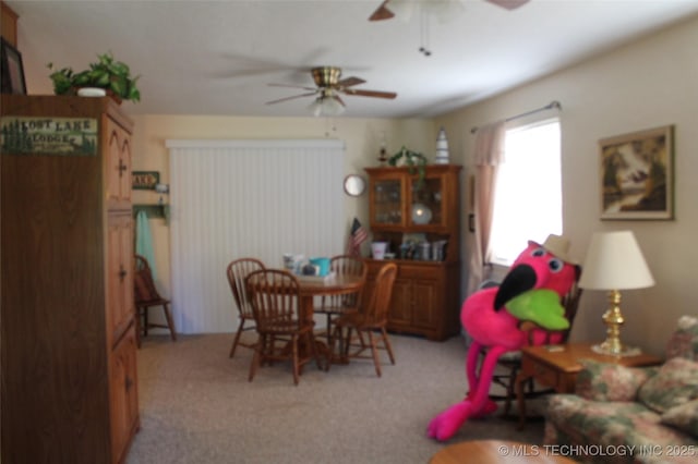 420902 E 1164th Rd, Eufaula, OK 74432 - dining space with a ceiling fan and carpet floors
