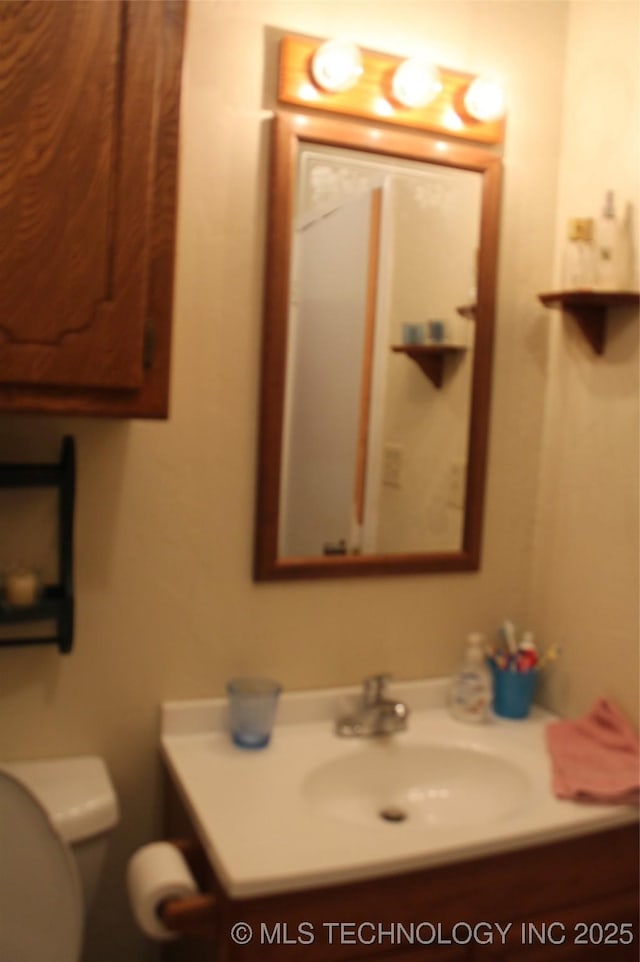 420902 E 1164th Rd, Eufaula, OK 74432 - bathroom featuring toilet and vanity
