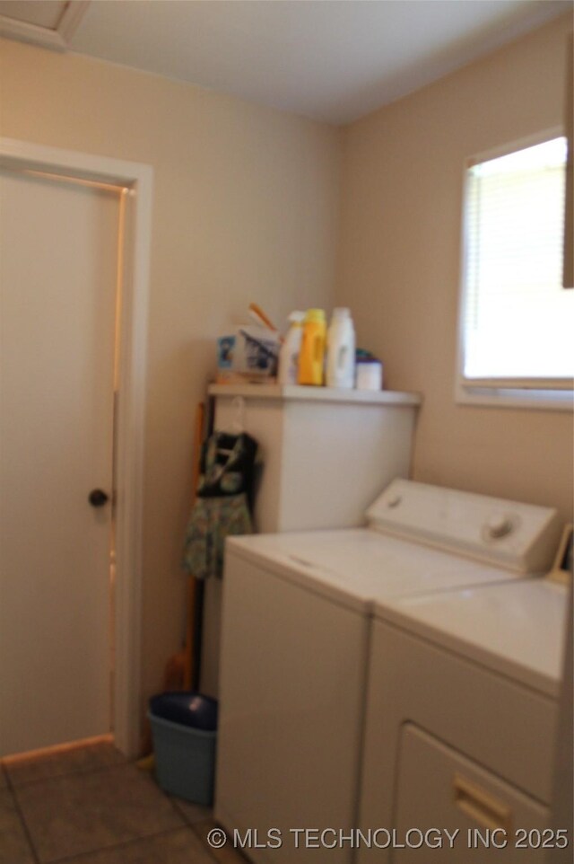 420902 E 1164th Rd, Eufaula, OK 74432 - washroom featuring washing machine and clothes dryer and tile patterned flooring