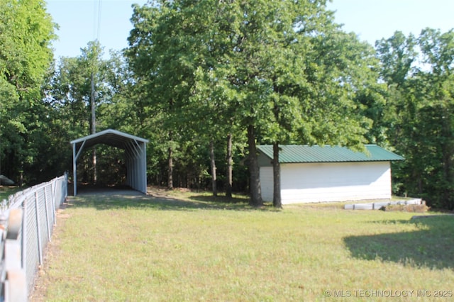 420902 E 1164th Rd, Eufaula, OK 74432 - view of yard featuring a carport and an outbuilding
