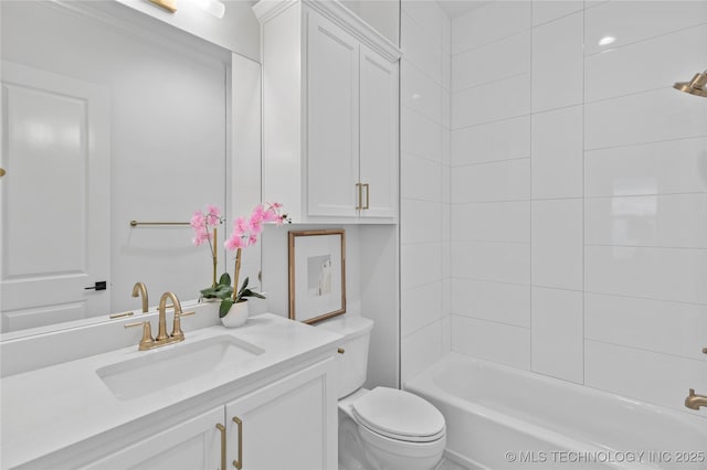 full bath with toilet, vanity, and tub / shower combination