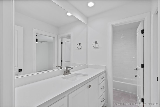 bathroom featuring vanity, recessed lighting, a ceiling fan, and bathtub / shower combination