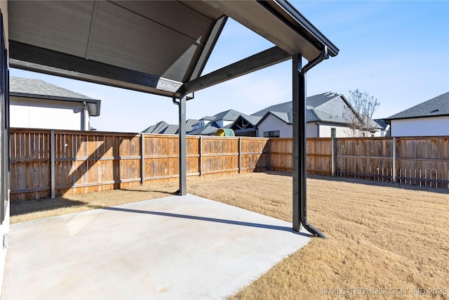 view of patio with a residential view