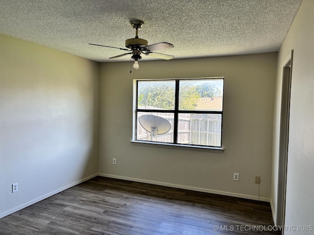 1612 Rustic Dr, Ardmore, OK 73401 - empty room featuring wood finished floors, ceiling fan, a textured ceiling, and baseboards