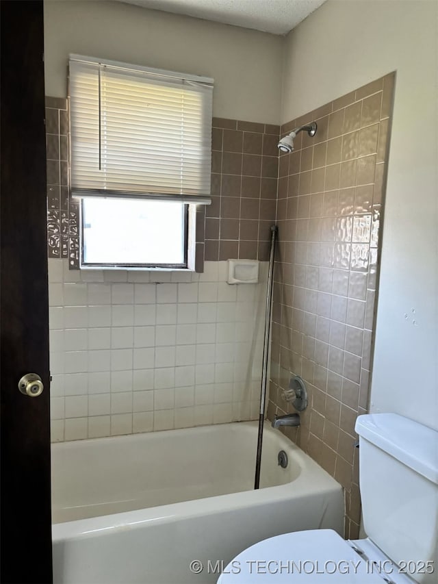 1612 Rustic Dr, Ardmore, OK 73401 - full bathroom featuring toilet and bathing tub / shower combination