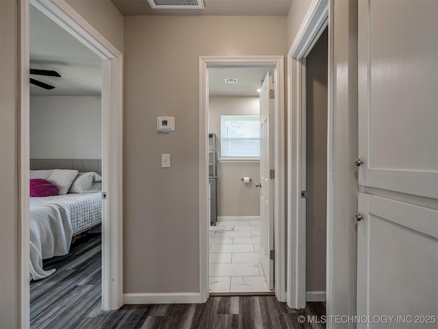 1149 N Hickory Pl, Broken Arrow, OK 74012 - hallway with baseboards and dark marble finish flooring