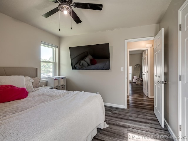 1149 N Hickory Pl, Broken Arrow, OK 74012 - bedroom with wood finished floors, baseboards, and a ceiling fan