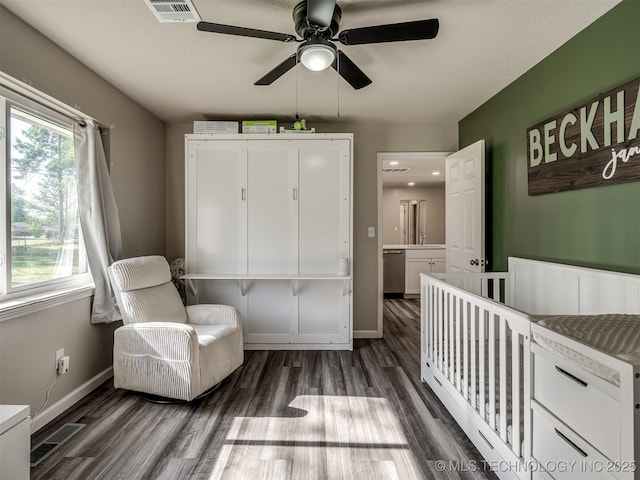 1149 N Hickory Pl, Broken Arrow, OK 74012 - bedroom featuring dark wood-style floors, baseboards, and ceiling fan