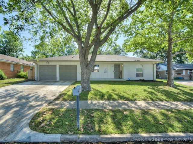 1149 N Hickory Pl, Broken Arrow, OK 74012 - single story home with a garage, concrete driveway, a front yard, and brick siding