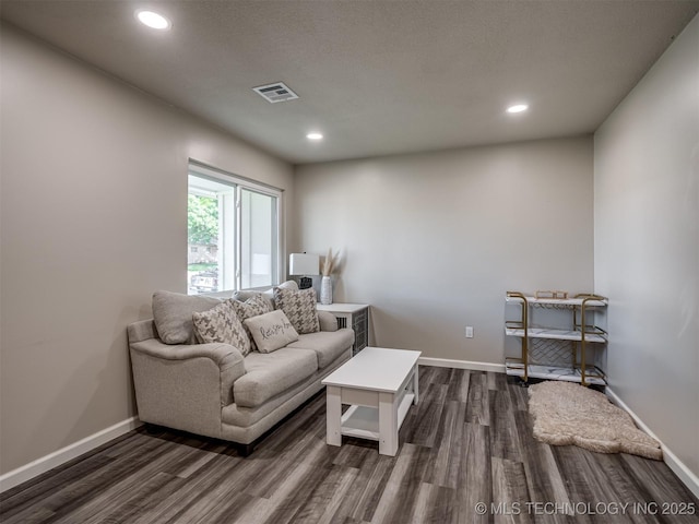 1149 N Hickory Pl, Broken Arrow, OK 74012 - living area with dark wood-type flooring, baseboards, and recessed lighting