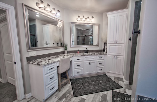 110 W Zachry Ln, Stigler, OK 74462 - full bath featuring a shower stall, vanity, and baseboards