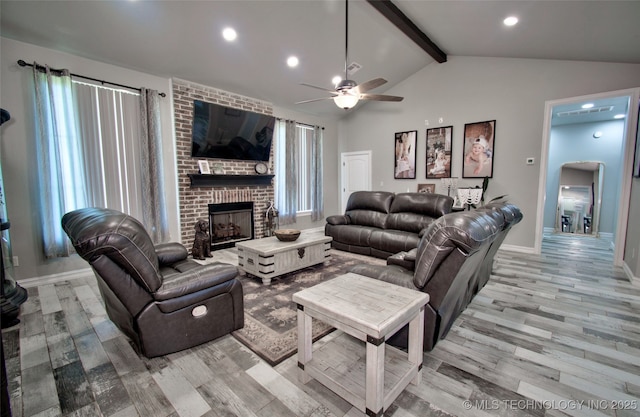 110 W Zachry Ln, Stigler, OK 74462 - living area featuring a fireplace, a ceiling fan, light wood finished floors, baseboards, and recessed lighting
