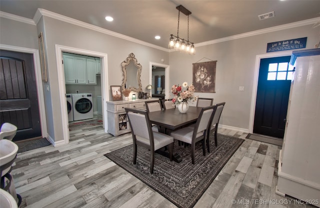 110 W Zachry Ln, Stigler, OK 74462 - dining area featuring independent washer and dryer, light wood-style floors, crown molding, recessed lighting, and baseboards