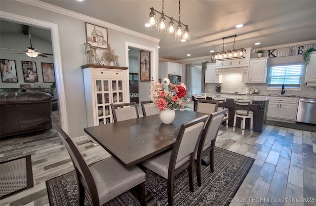 110 W Zachry Ln, Stigler, OK 74462 - dining room with crown molding, ceiling fan, light wood-type flooring, and recessed lighting