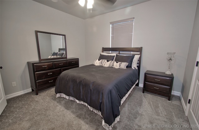 110 W Zachry Ln, Stigler, OK 74462 - carpeted bedroom with baseboards and a ceiling fan