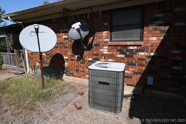 7457 S 105th St E, Braggs, OK 74423 - exterior view of cooling unit and brick siding