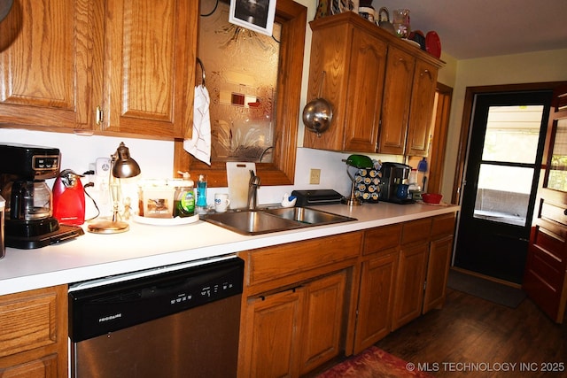 7457 S 105th St E, Braggs, OK 74423 - kitchen with stainless steel dishwasher, a sink, light countertops, and brown cabinets
