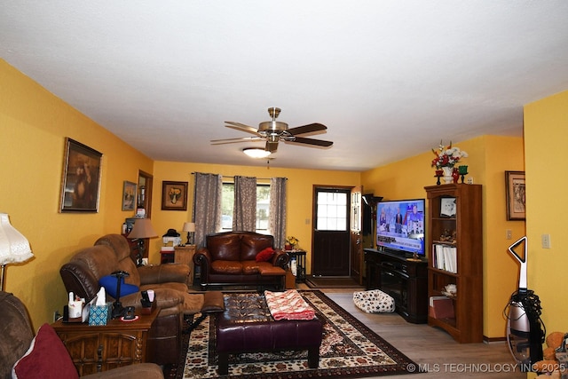 7457 S 105th St E, Braggs, OK 74423 - living room featuring wood finished floors and ceiling fan