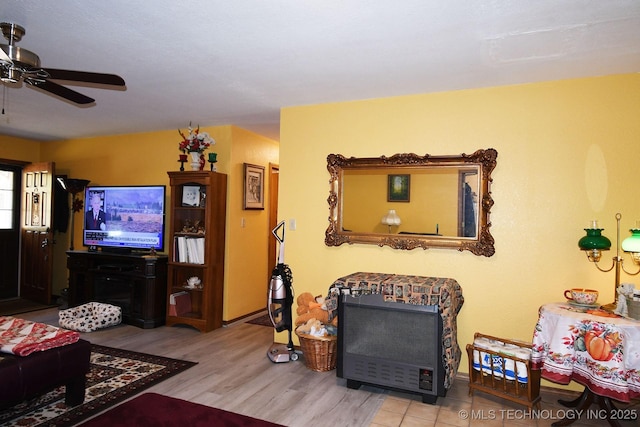 7457 S 105th St E, Braggs, OK 74423 - living room featuring ceiling fan and wood finished floors