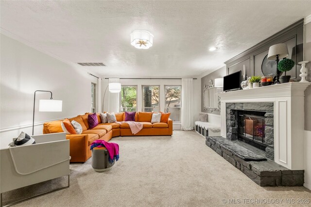 6315 E 98th Pl, Tulsa, OK 74137 - carpeted living room with a fireplace and ornamental molding