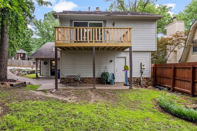 6315 E 98th Pl, Tulsa, OK 74137 - rear view of house with a balcony and a patio area