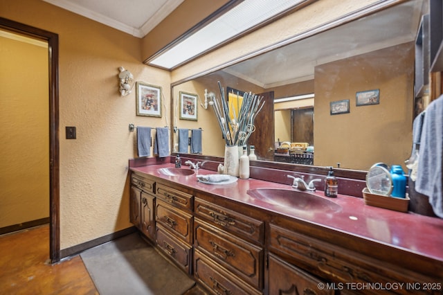 17711 E Archer St, Catoosa, OK 74015 - full bathroom with ornamental molding, double vanity, a textured wall, and baseboards