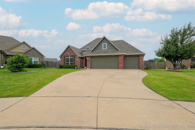 4314 S 132nd E Ave, Tulsa, OK 74134 - view of front of property featuring brick siding, concrete driveway, a garage, and roof with shingles