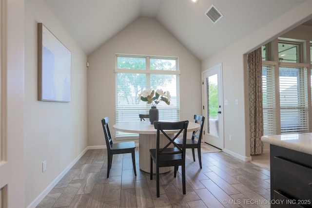 4314 S 132nd E Ave, Tulsa, OK 74134 - dining space with vaulted ceiling, light wood-type flooring, and baseboards