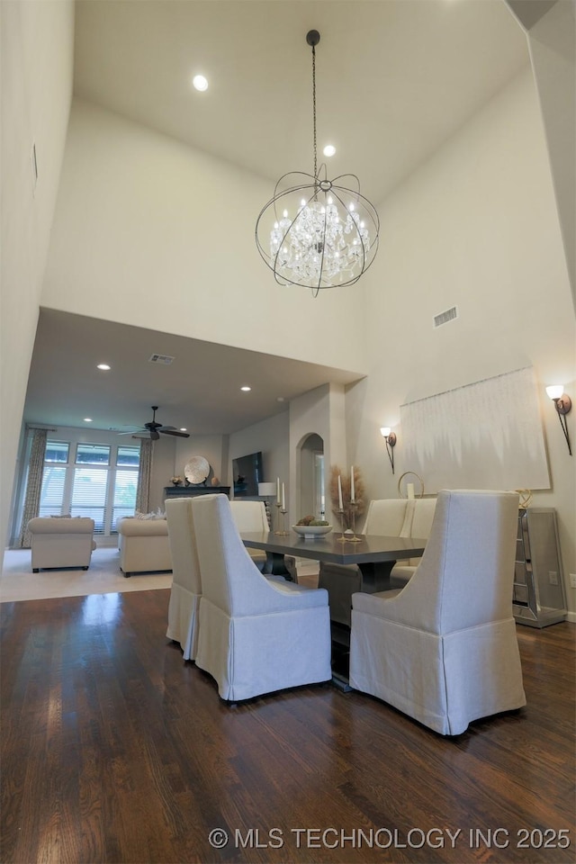 4314 S 132nd E Ave, Tulsa, OK 74134 - living area with a towering ceiling, wood finished floors, a chandelier, and recessed lighting