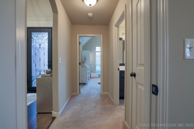 4314 S 132nd E Ave, Tulsa, OK 74134 - corridor with arched walkways, light carpet, and baseboards