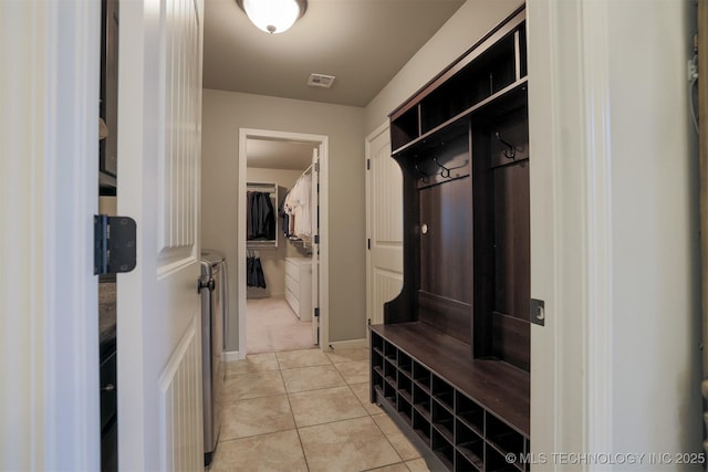 4314 S 132nd E Ave, Tulsa, OK 74134 - mudroom featuring light tile patterned floors and baseboards